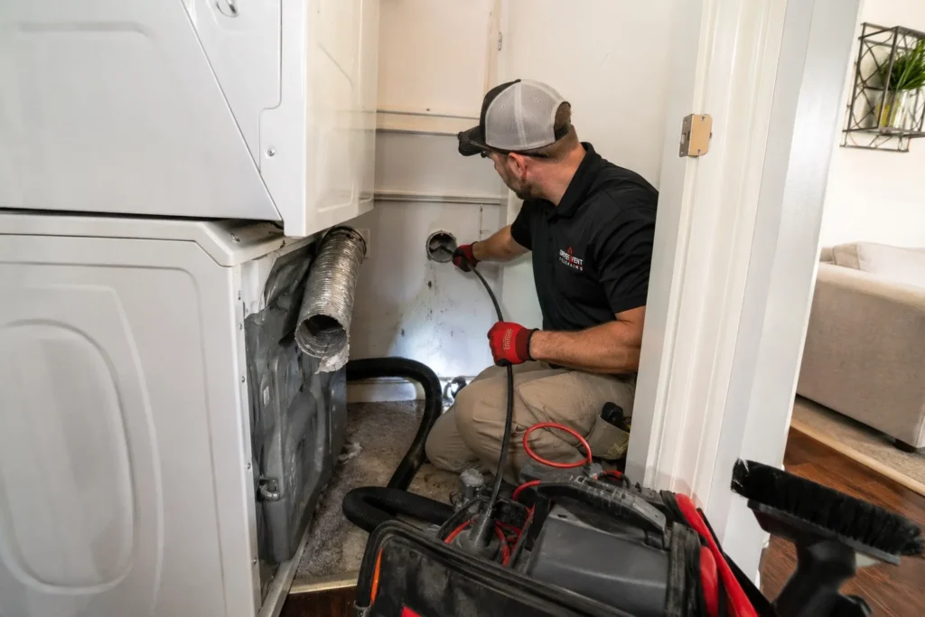 Dryer vent cleaning in a Hallandale Beach condo laundry closet