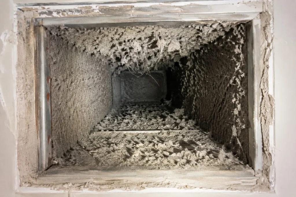 Dust built up inside a South Florida return duct before cleaning