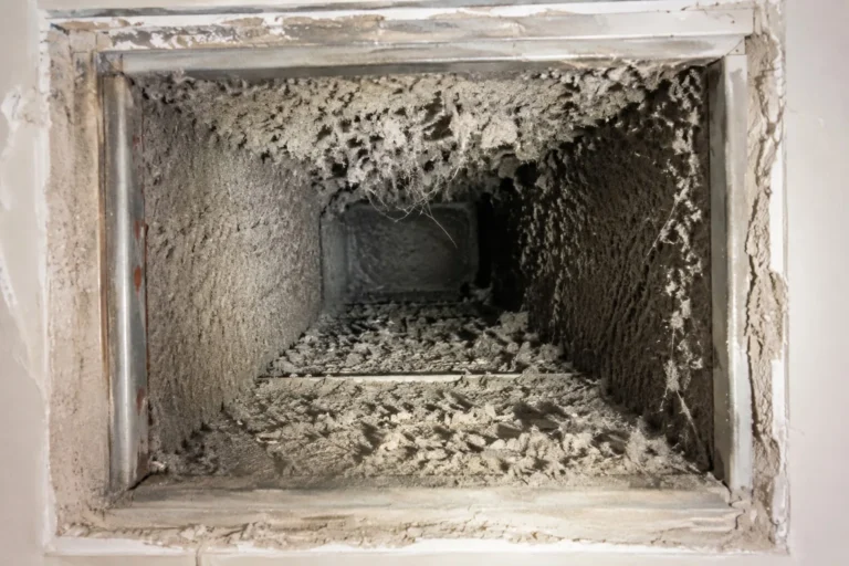 Dust built up inside a South Florida return duct before cleaning